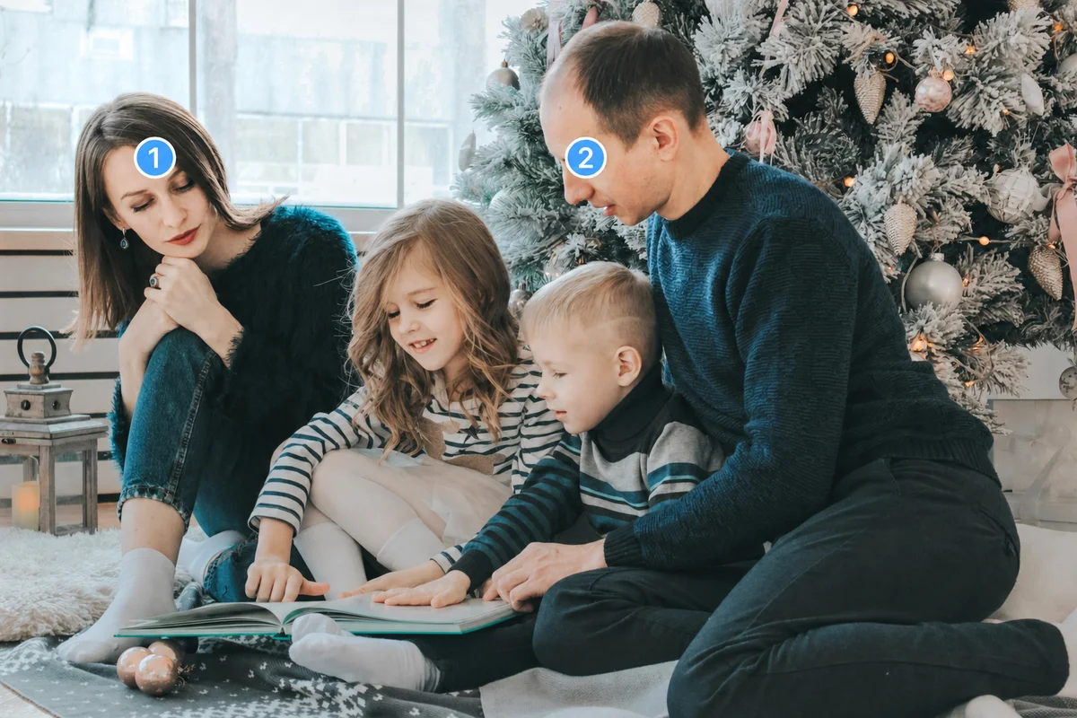 Illustrative family photo annotated with numbered markers one and two